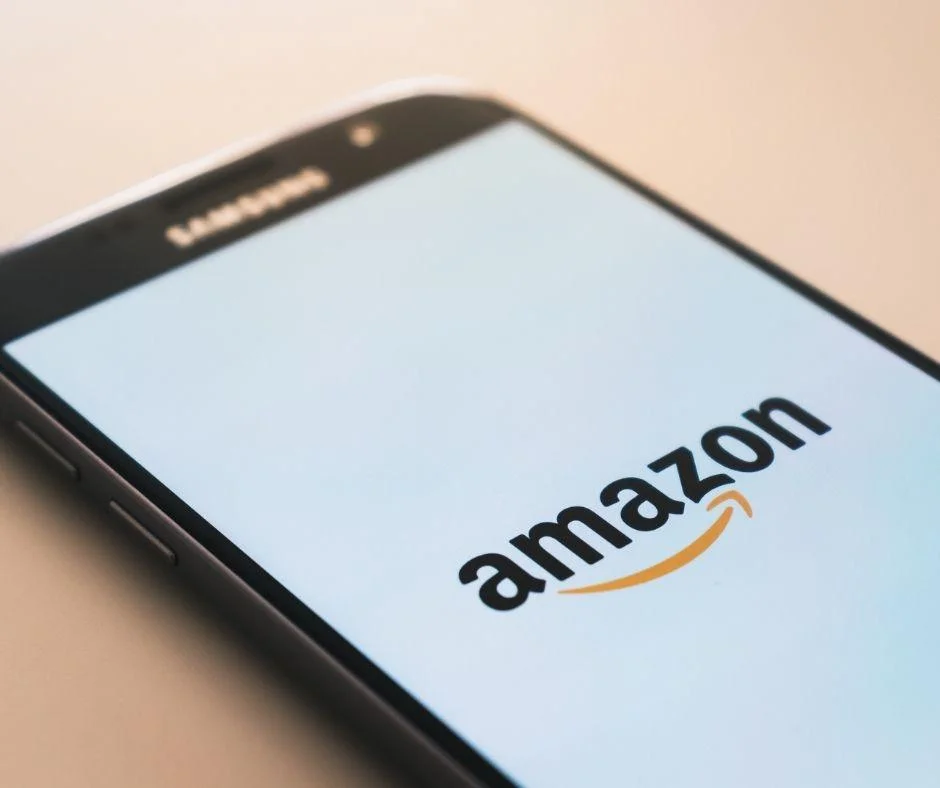 Samsung smartphone displaying the Amazon app logo, highlighting digital marketing performance across platforms.