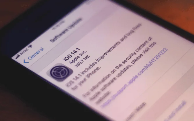 Smartphone screen showing iOS 14.1 software update, relevant to its impact on Facebook Ads tracking.