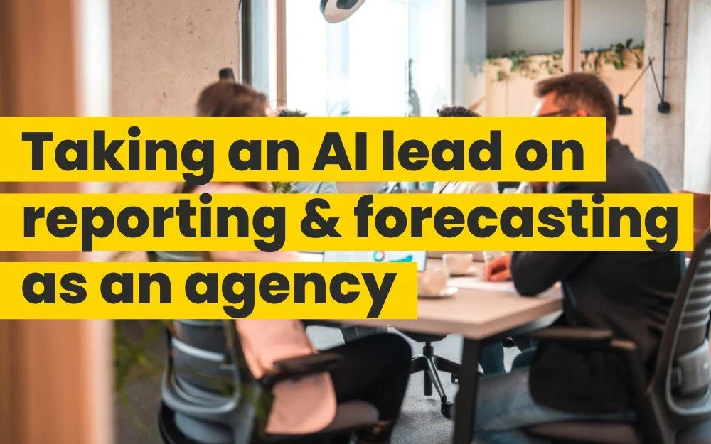 Agency team meeting in a conference room, with text highlighting AI-driven reporting and forecasting leadership.