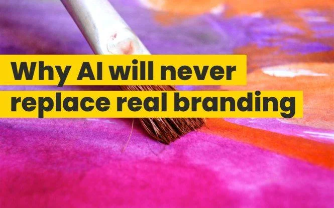Paintbrush on vibrant watercolor background with headline about why AI will never replace real branding.